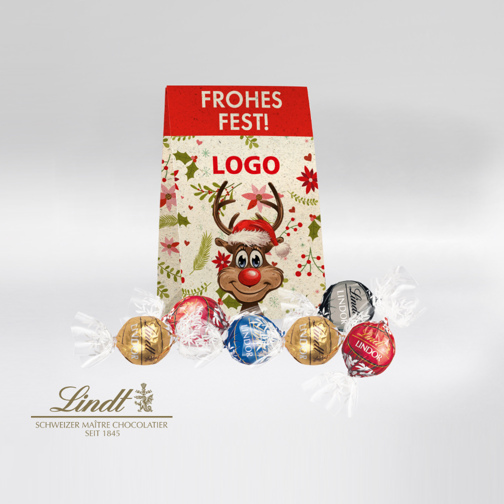Lindt Weihnachtsverpackung mit Rentiermotiv, Aufschrift Frohes Fest und Logo-Feld, gefüllt mit bunten Lindor Kugeln in Gold, Rot, Blau und Schwarz